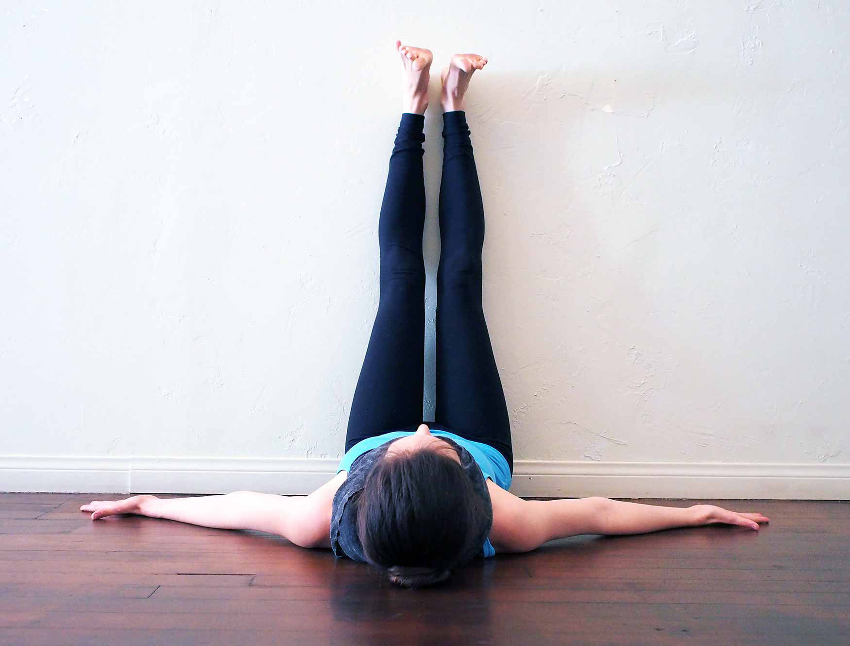 Viparita Karani (Legs Up The Wall Pose) - Vinyasa Yoga Academy Blogs